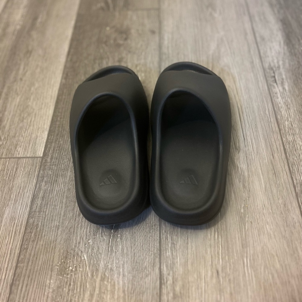 Brad new Yeezy Onyx Slides with original box.
